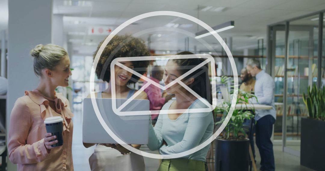 Modern Office Collaboration with Digital Email Icon Overlay