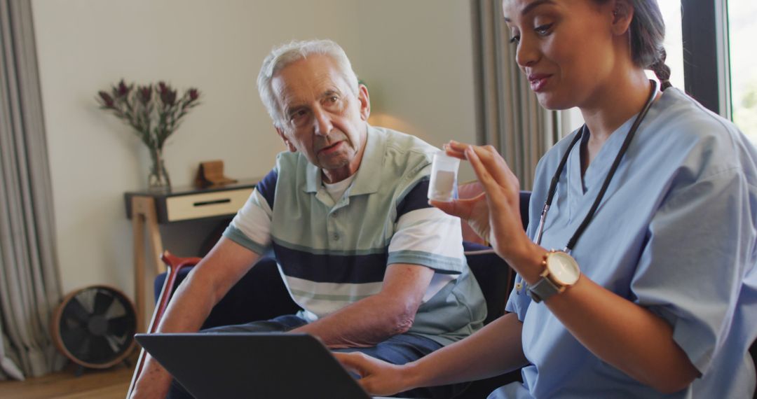 Elderly Man Receiving Medical Advice from Nurse at Home - Free Images, Stock Photos and Pictures on Pikwizard.com