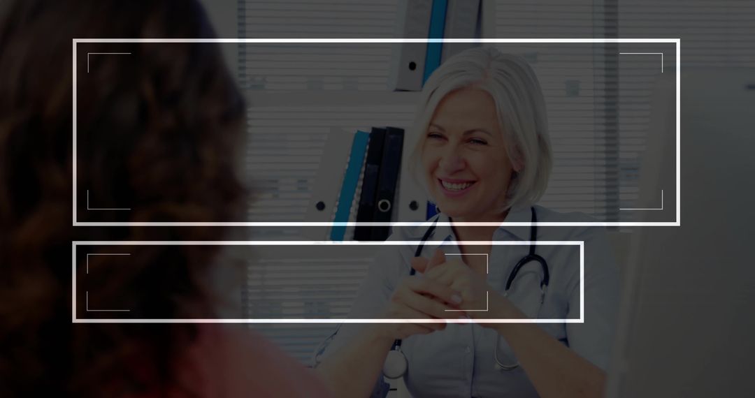 Smiling Physician Consulting Patient in Modern Medical Office