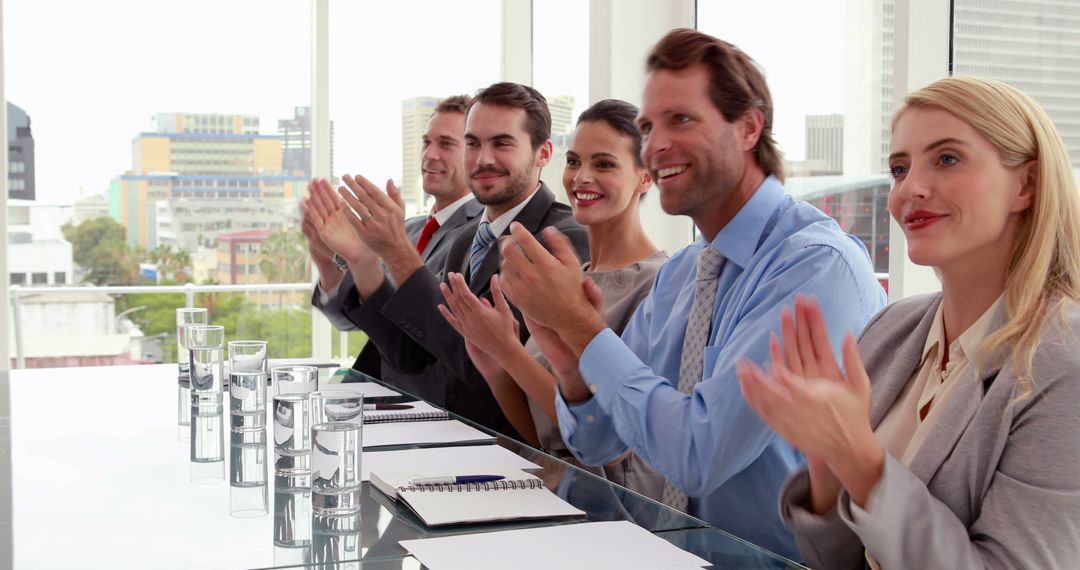 Business Professionals Applauding During Meeting in Modern Office - Free Images, Stock Photos and Pictures on Pikwizard.com