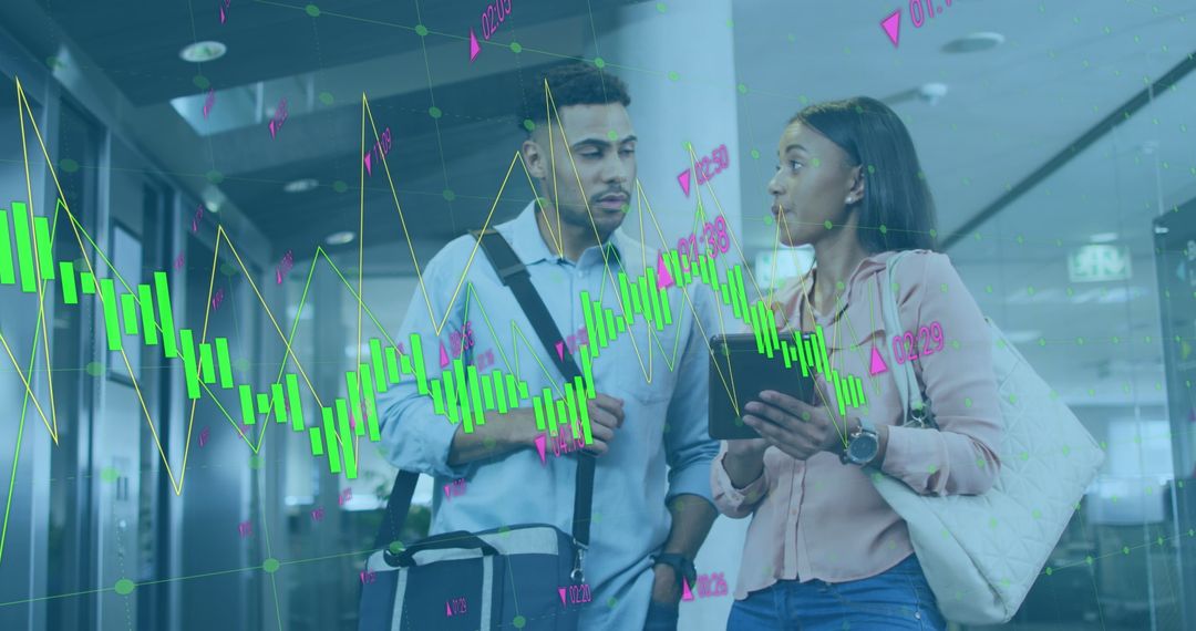 Business Professionals Discussing Digital Data Analysis in Office Space
