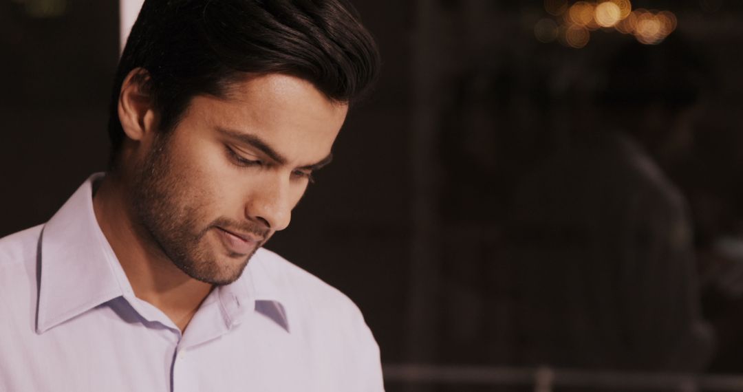 Focused Businessman Working Late in Office Environment