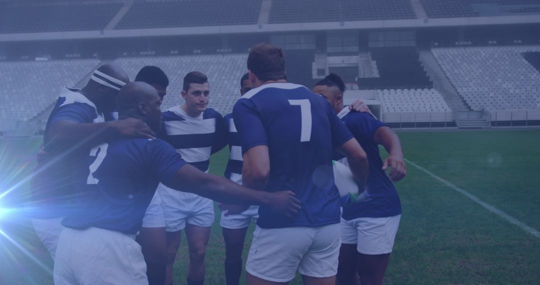 Rugby Players in Team Huddle Preparing for Match