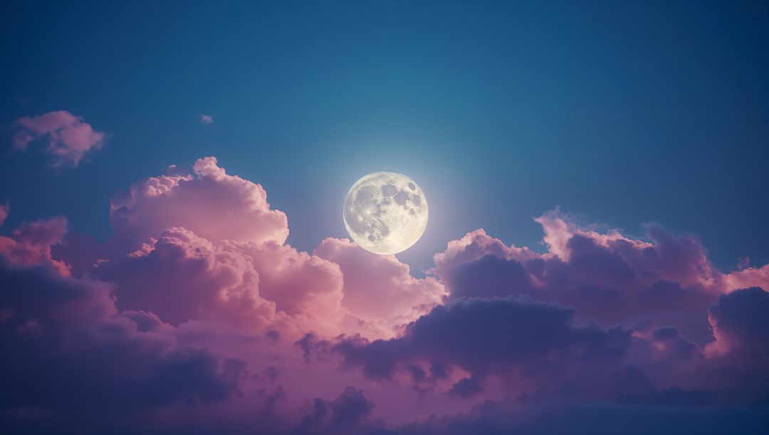 Full Moon Illumines Celestial Skies with Pink and Purple Clouds
