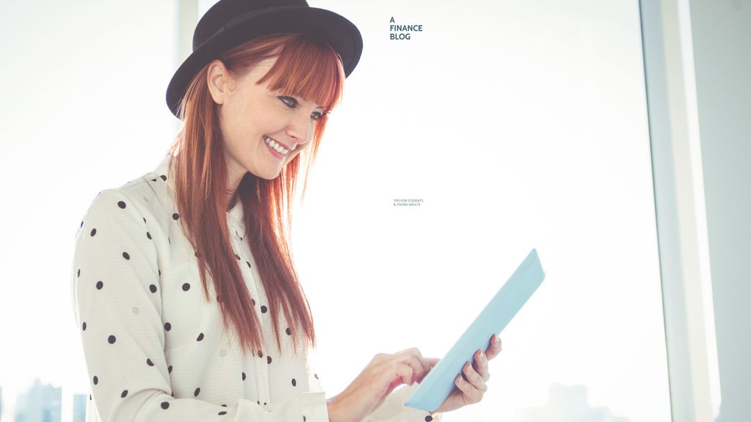Trendy woman with tablet in bright room engaged in finance blog