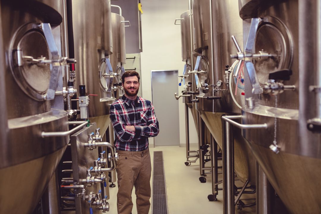 Brewery Professional Overseeing Commerical Beer Production Tanks