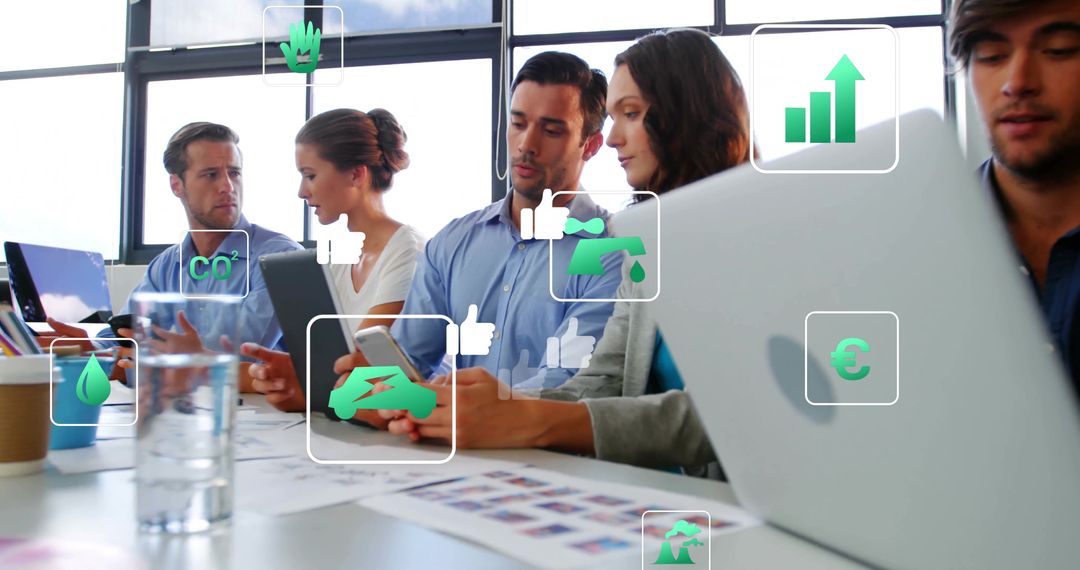 Business Team Collaborating with Digital Data Icons in Meeting Room