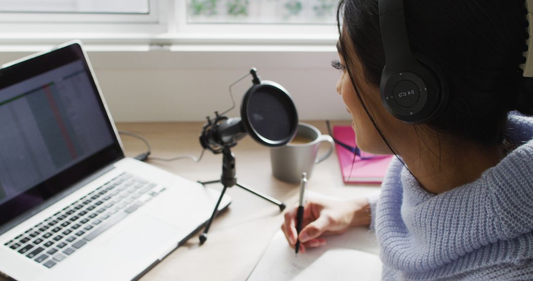 Woman Recording Podcast at Home Desk with Laptop and Microphone - Free Images, Stock Photos and Pictures on Pikwizard.com