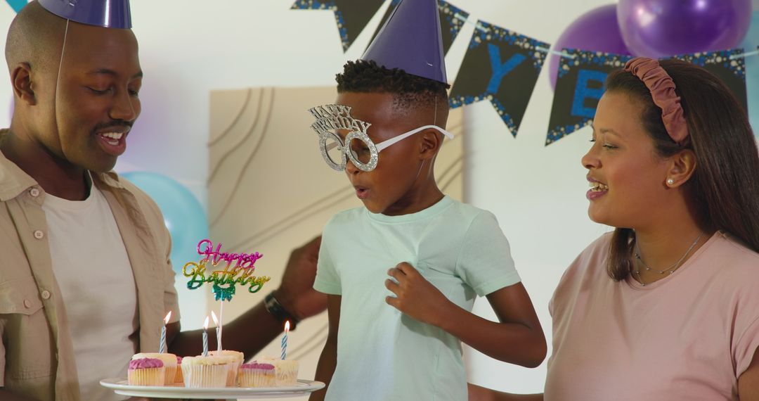 Happy Family Birthday Celebration with Cake and Candles