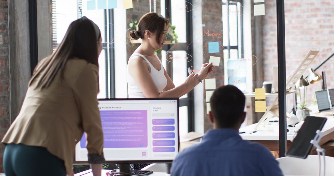 Collaborative Team in Modern Office Analyzing AI Chatbot