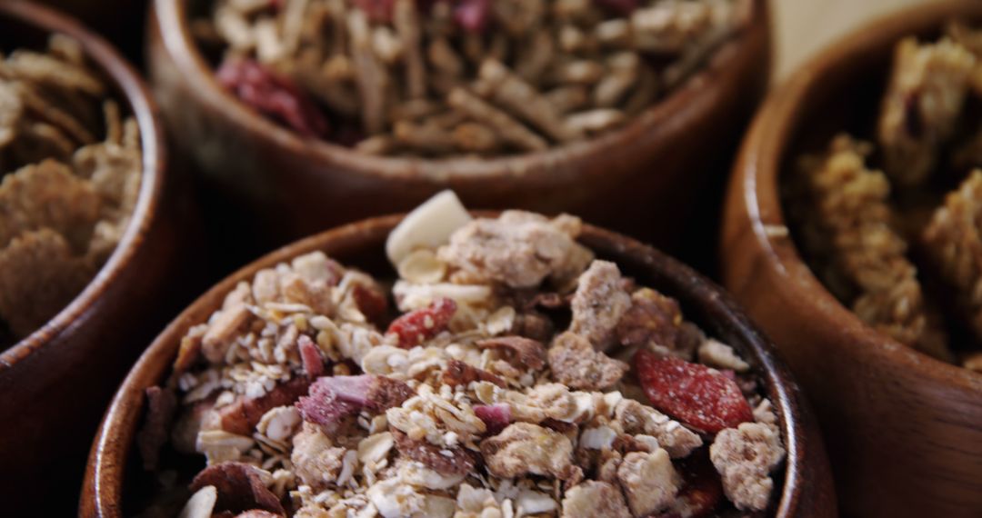 Assorted Healthy Breakfast Cereals with Fruits and Grains in Wooden Bowls - Free Images, Stock Photos and Pictures on Pikwizard.com