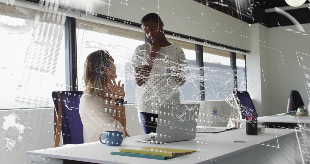 Diverse Colleagues Discussing Work with Digital Global Interface