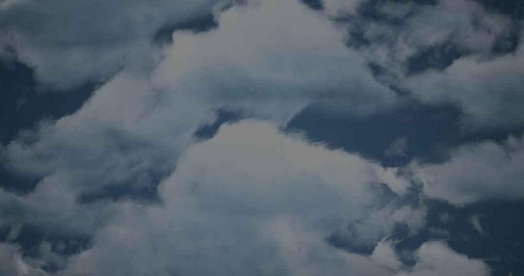 Serene Sky with Fluffy Clouds