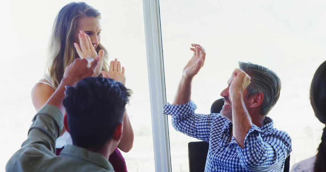 Diverse Team Embracing Success with High-Five