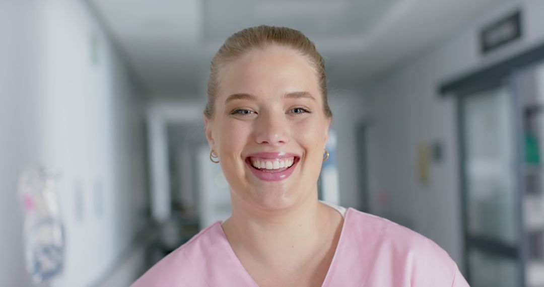 Smiling Nurse in Hospital Setting - Free Images, Stock Photos and Pictures on Pikwizard.com