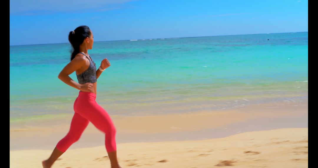 Active Woman Jogging on Tropical Beach on Clear Day - Free Images, Stock Photos and Pictures on Pikwizard.com