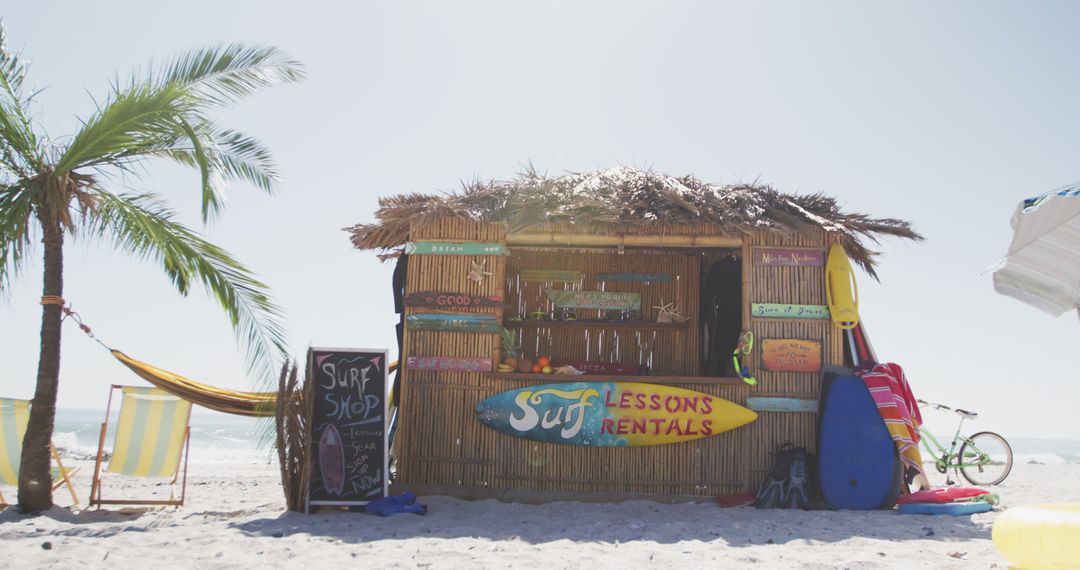 Tropical Surf Shop Hut on Sunny Beach - Free Images, Stock Photos and Pictures on Pikwizard.com