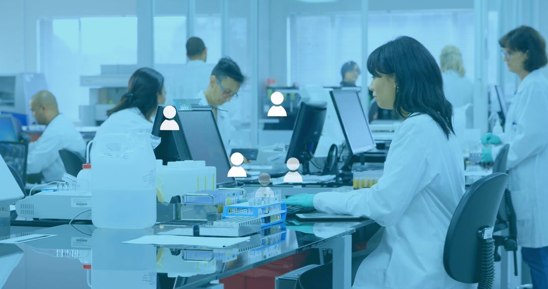 Diverse Doctors Using Digital Technology in Modern Laboratory