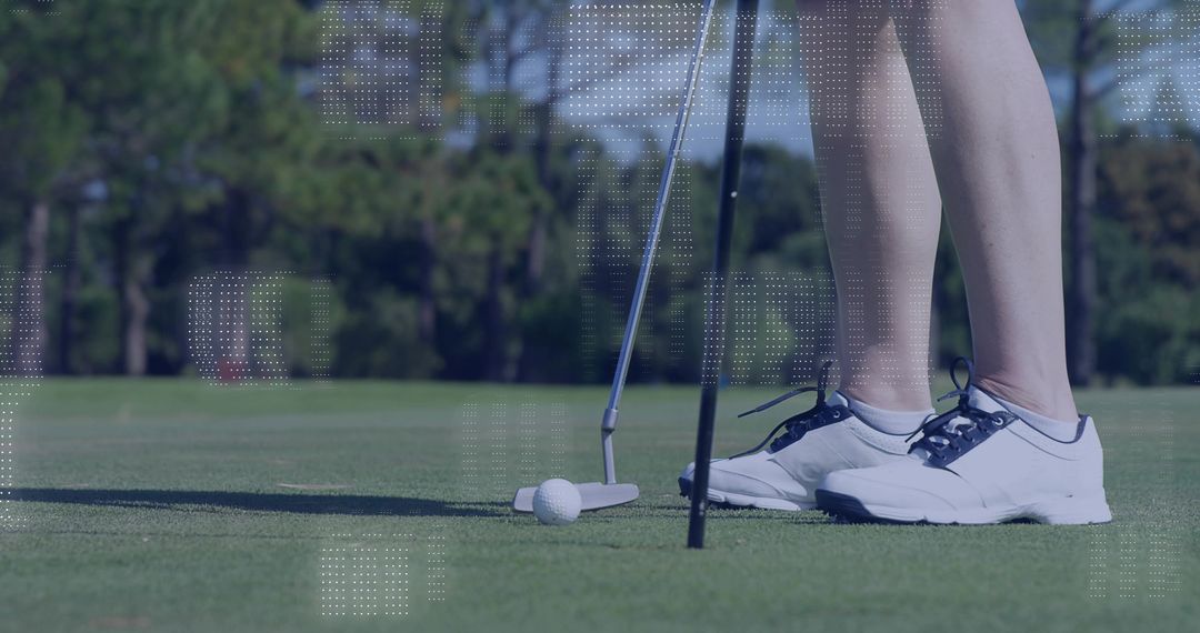 Close-Up of Golfer Aligning Putt on Green in Sporting Gear