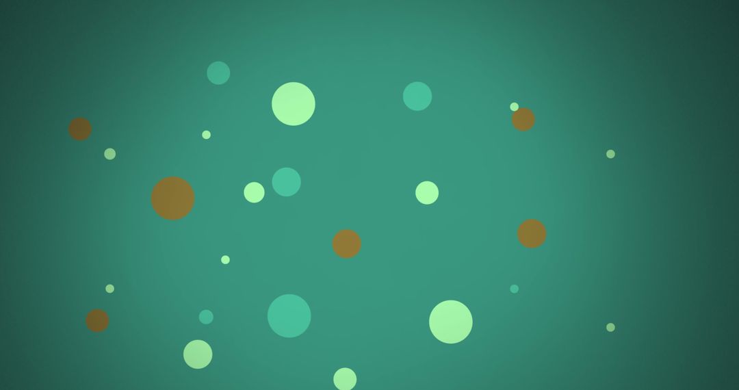 Multicolored Dots on Green Background Illustrating Motion and Vibrancy