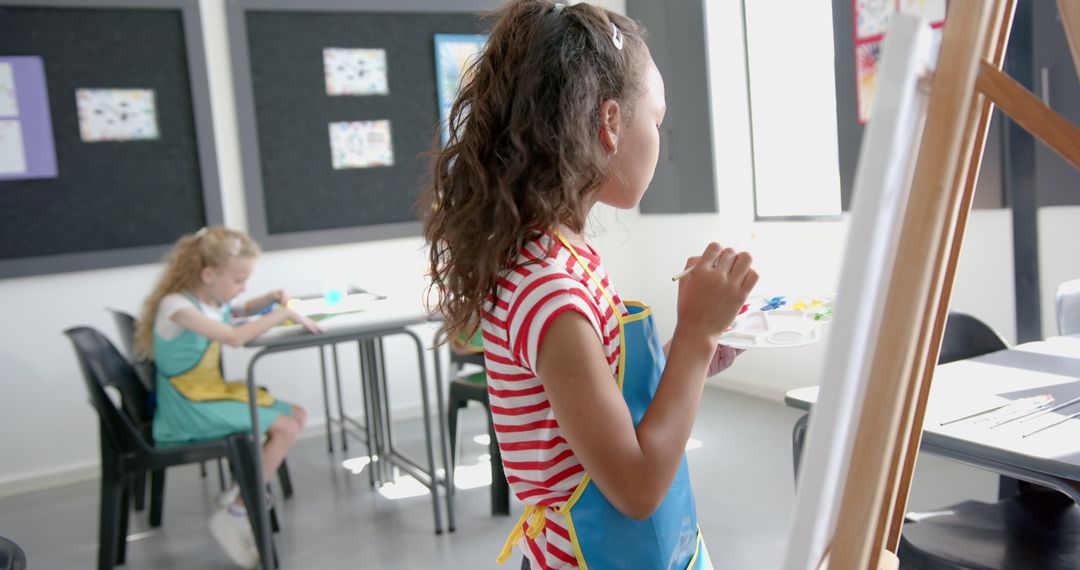 Creative Children Painting in Classroom, Expressing Art and Imagination