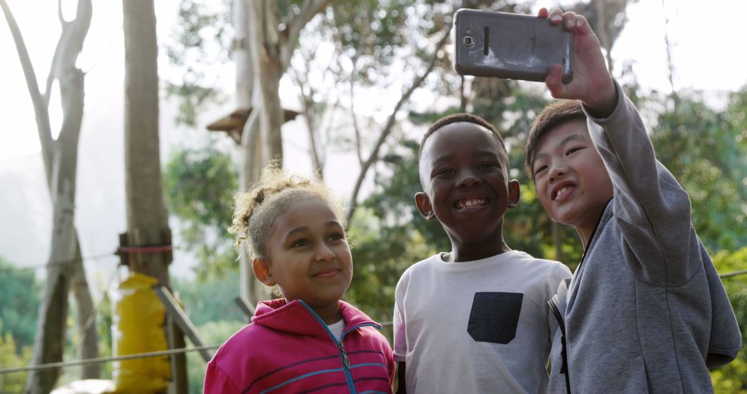 Diverse Kids Taking Selfie Outdoors in Nature - Free Images, Stock Photos and Pictures on Pikwizard.com