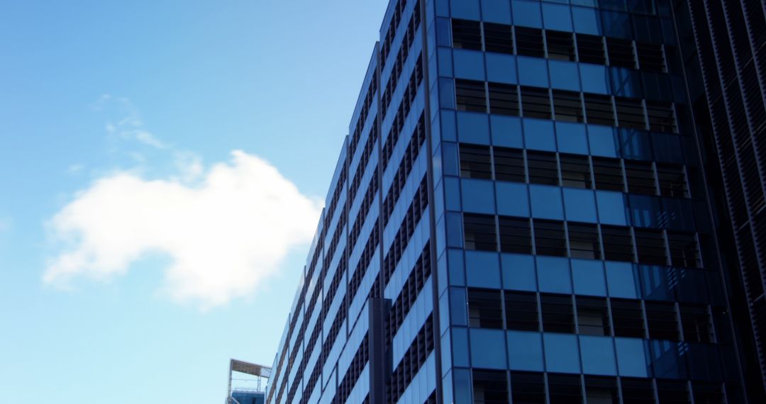 Modern Office Building Against Sky with Window Reflection - Free Images, Stock Photos and Pictures on Pikwizard.com