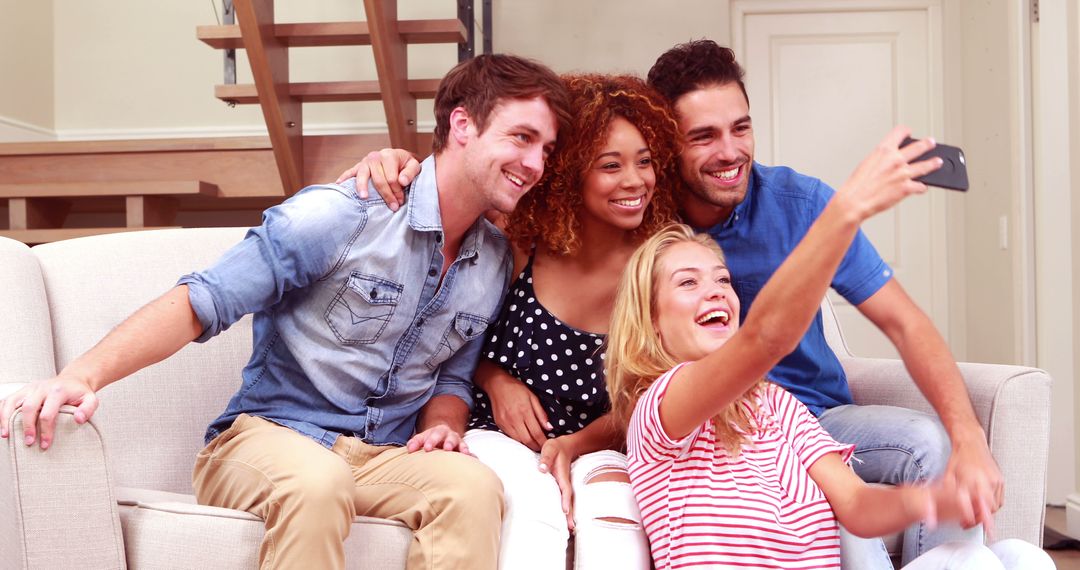 Group of Diverse Friends Taking Selfie on Sofa in Modern Home - Free Images, Stock Photos and Pictures on Pikwizard.com