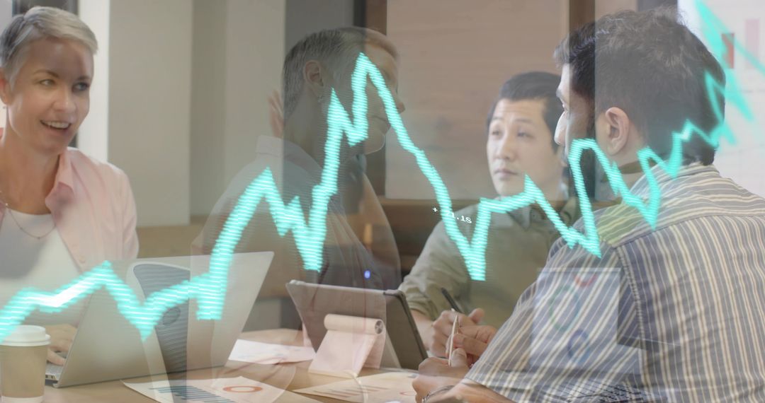 Business Team Collaborating on Financial Data with Graph Overlay