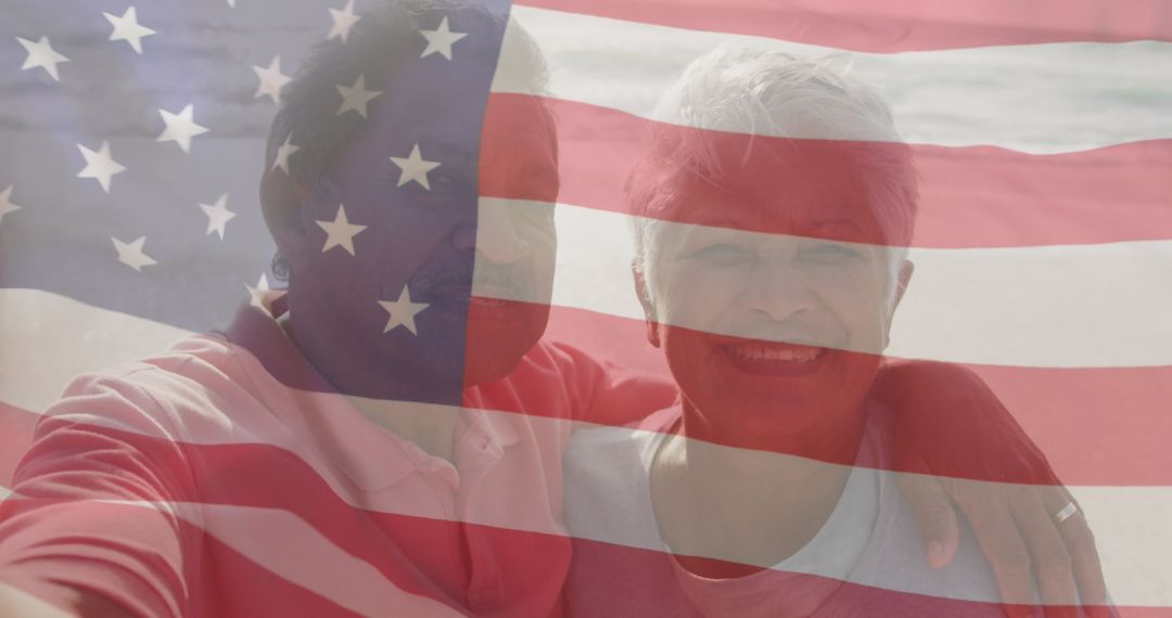 Senior Couple Embracing Overlaid with American Flag on Beach