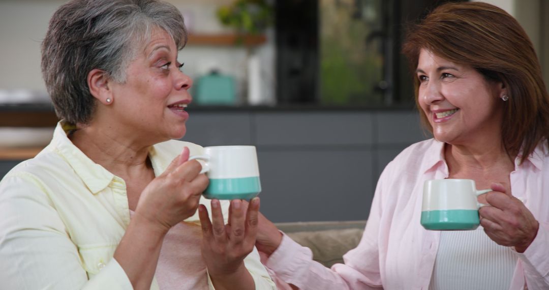 Mother and Daughter Enjoying Coffee and Conversation