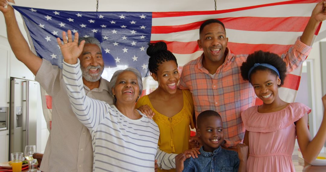 Smiling Family Celebrating with American Flag - Free Images, Stock Photos and Pictures on Pikwizard.com