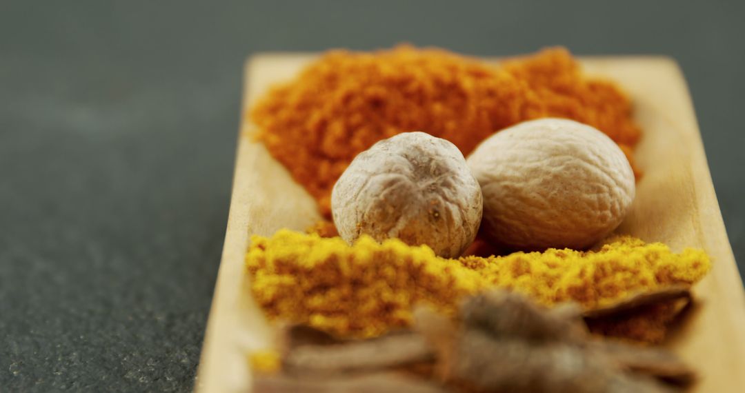 Close-Up of Various Indian Spices on Wooden Plate - Free Images, Stock Photos and Pictures on Pikwizard.com