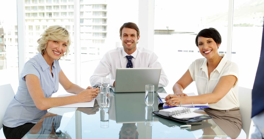 Business Team Meeting with Laptops in Modern Office - Free Images, Stock Photos and Pictures on Pikwizard.com