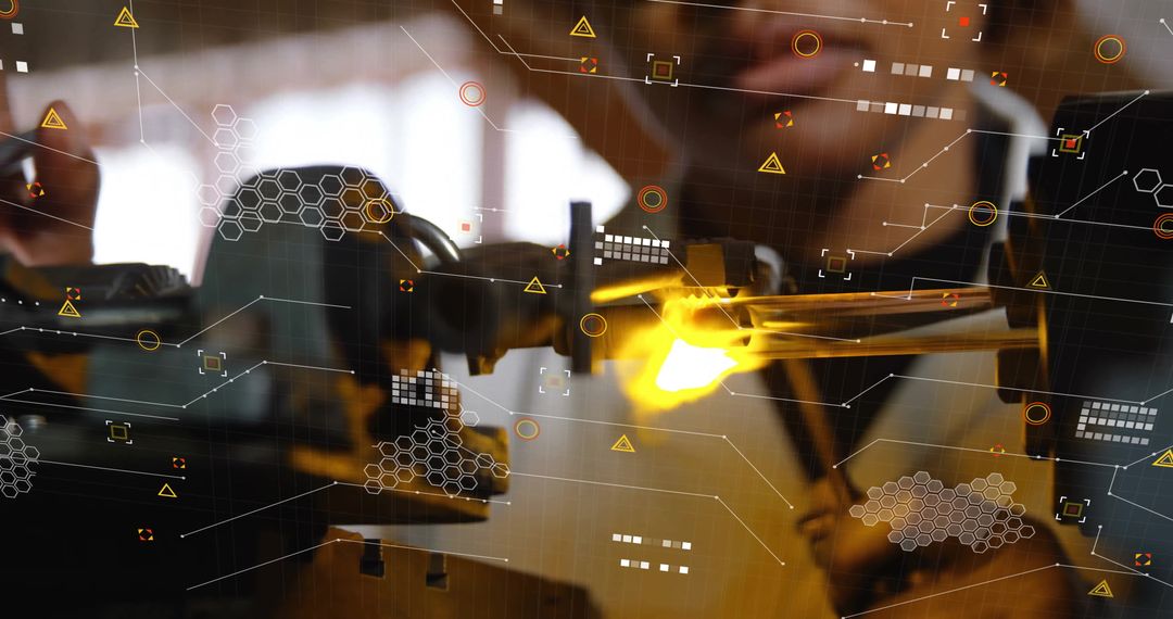 Technician Guiding Robotic Welding Arm in Industrial Automation Setting