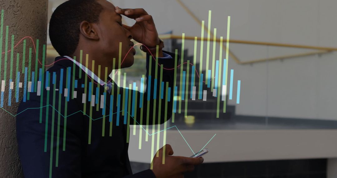 Stressed Businessman Checking Analytics on Smartphone