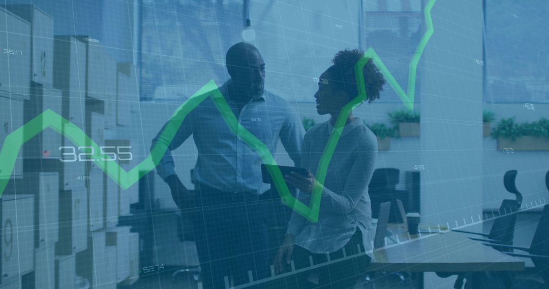 Business Professionals Discussing Data Trends with Graph Overlay