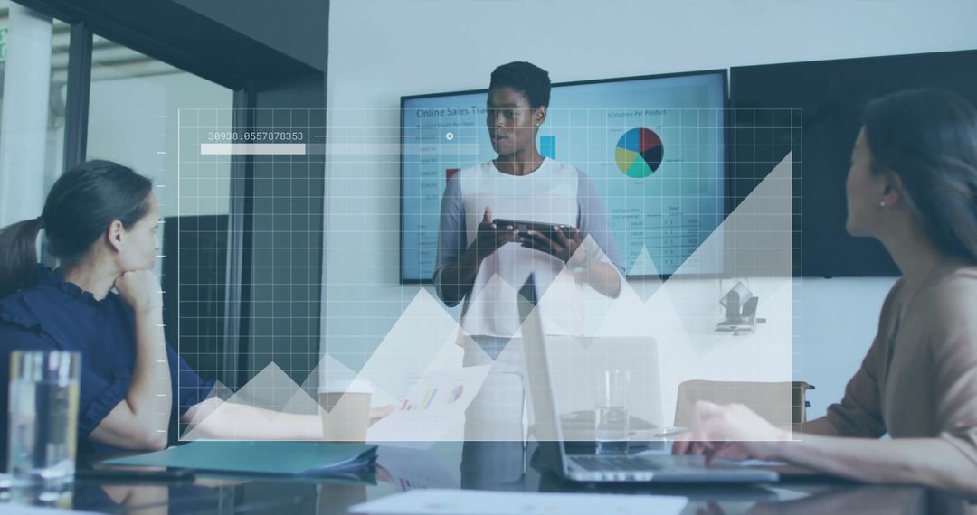 Diverse Team Discussing Financial Data in Modern Office Environment