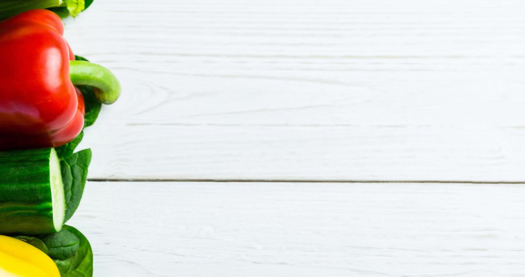 Vibrant Vegetables Assortment on White Table with Ample Copy Space