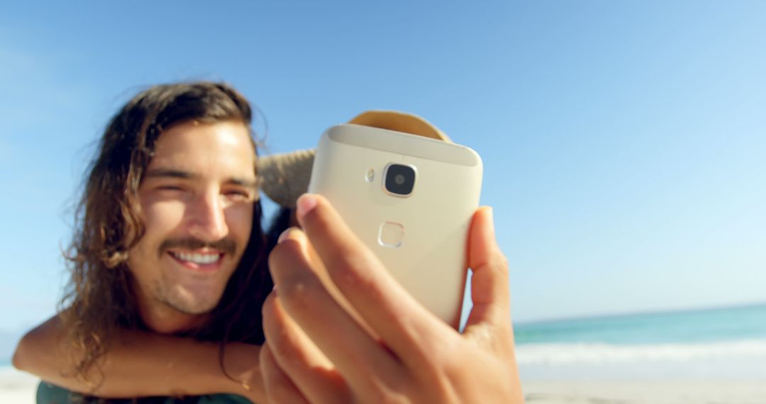 Young Couple Taking Selfie on Beach During Summer Vacation - Free Images, Stock Photos and Pictures on Pikwizard.com