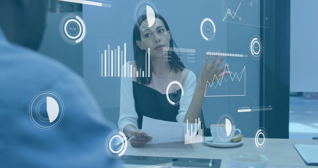 Mixed-Race Businesswoman Using Digital Interface for Data Visualization