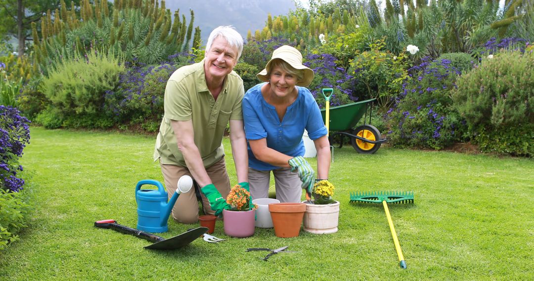 Retired Couple Gardening Together in Bright Sunny Garden - Free Images, Stock Photos and Pictures on Pikwizard.com