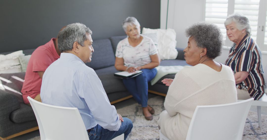 Senior support group having a discussion during a meeting - Free Images, Stock Photos and Pictures on Pikwizard.com