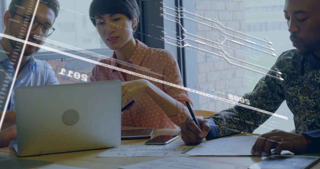 Diverse Team Collaborating on Modern Business Technology