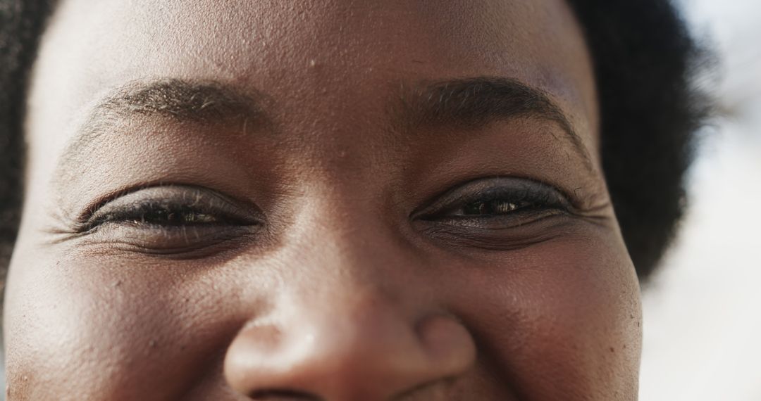 Close-up of Smiling African American Woman's Eyes - Free Images, Stock Photos and Pictures on Pikwizard.com