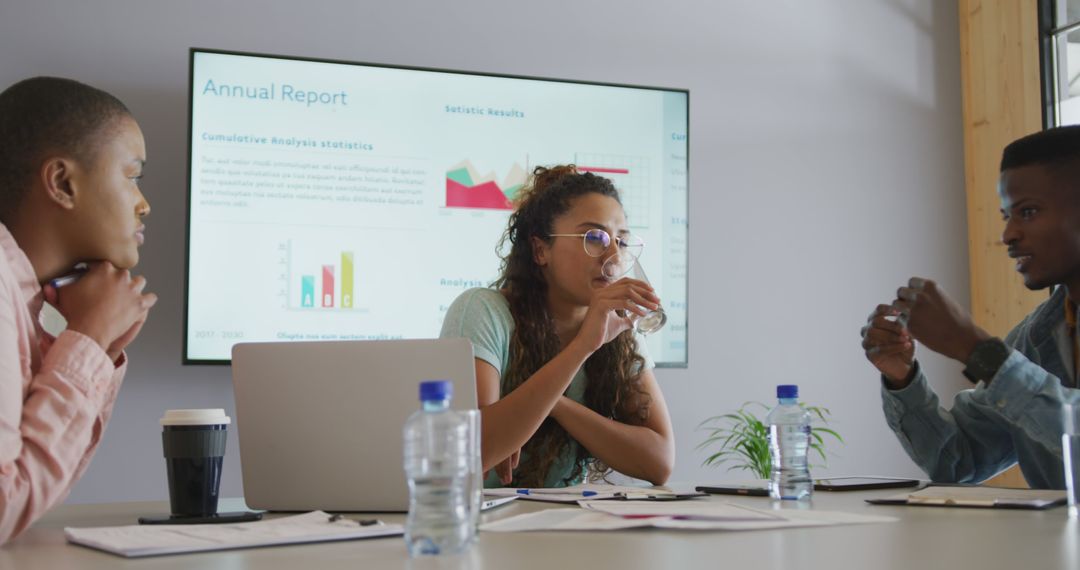 Diverse Team Discussing Business Reports and Ideas