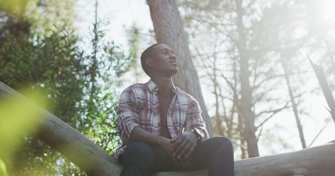 African American Man Enjoying Peaceful Moment Outdoors in the Forest - Free Images, Stock Photos and Pictures on Pikwizard.com