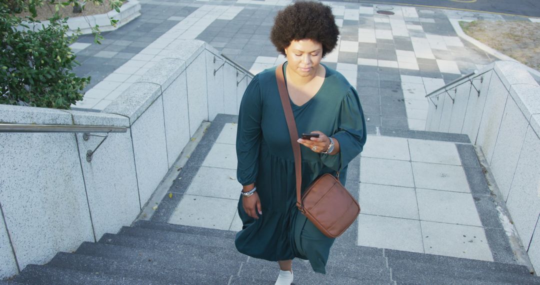 Plus Size Digital Nomad Ascending Stairs in Urban Environment