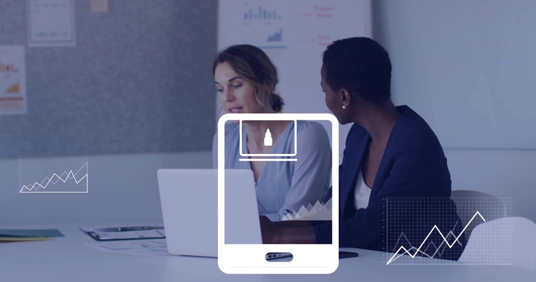 Two Professionals Collaborating on Laptop with Analytics Overlays and Mobile Interface