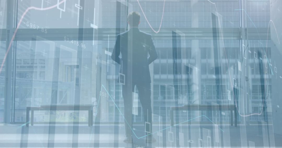 Businessman Overlaid with Financial Data Visualizations